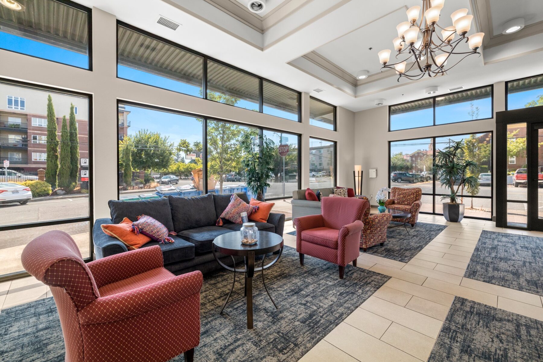 clubhouse lobby with floor-to-ceiling windows and couch and lounge seating